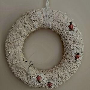 Elegant Lace Wreath with Pink Accents